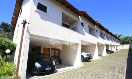 CASA EM CONDOMÍNIO 3 QUARTOS E 2 VAGAS DE GARAGEM NO BAIRRO TRISTEZA