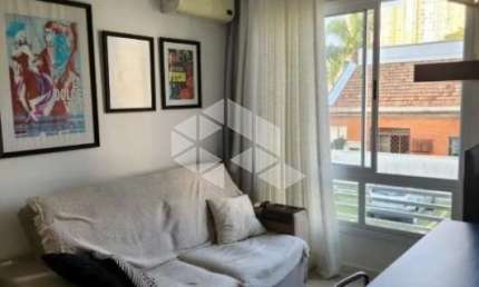 Apartamento com 2 dormitórios, sendo 1 suíte com vaga de garagem escriturada