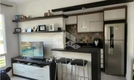 Apartamento com 2 dormitórios, sendo 1 suíte com vaga de garagem escriturada