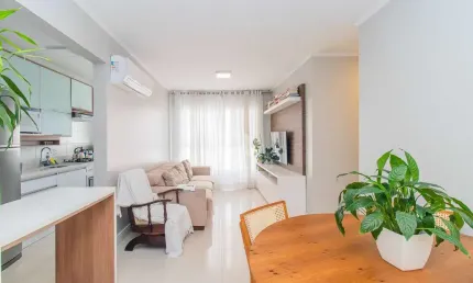 Apartamento de 3 dormitórios, sendo uma suíte, semimobiliado, decorado, com uma vaga escriturada. Bairro Cavalhada em Porto Alegre. Financia e aceita