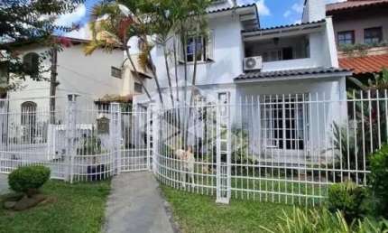 Casa com 4 quartos à venda na Rua Adão Pinheiro da Silva, 215, Ipanema, Porto Alegre