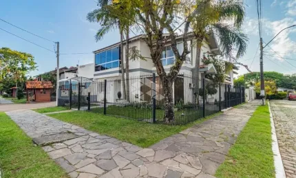 Casa com 4 quartos à venda na Rua Adão Pinheiro da Silva, 140, Ipanema, Porto Alegre
