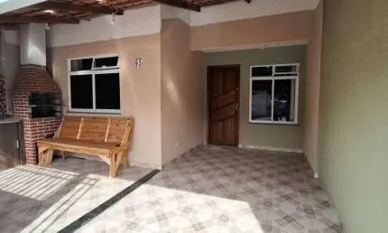 Excelente residência em condomínio fechado na Fazenda Rio Grande