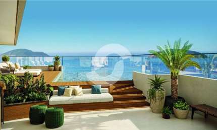 Apartamento frente mar com 4 suítes e 3 vagas em Camboinhas