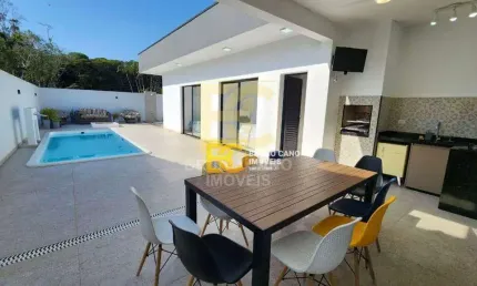 Casa térrea moderna com piscina em condomínio  - residencial jardim são luís - peruíbe/sp
