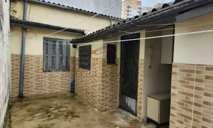 Terreno com três casas para renda ou construção na mooca