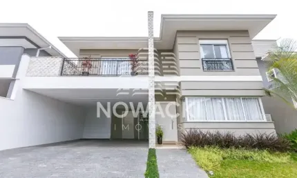 CASA EM CONDOMINIO COM 4 SUITES E 4 VAGAS EM SANTA FELICIDADE