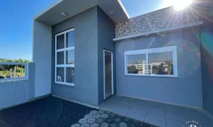 Casa Moderna 2 Dormitórios, 1 suíte - Bairro Centro na praia do Imbé/RS.