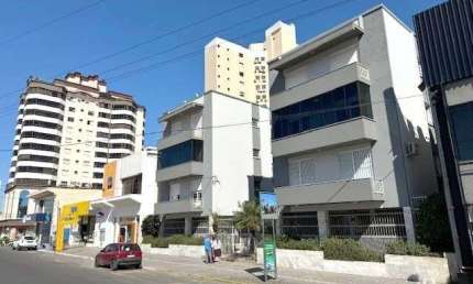 Excelente apartamento de 02 dormitórios no centro de Tramandaí