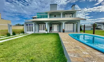 Casa com 3 quartos à venda na Avenida Oswaldo Bastos, 1197, Zona Nova, Tramandaí