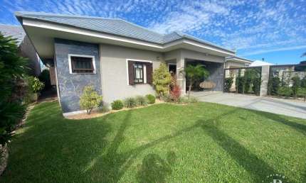 Casa moderna à venda em Nova Tramandaí – conforto, lazer e sofisticação!