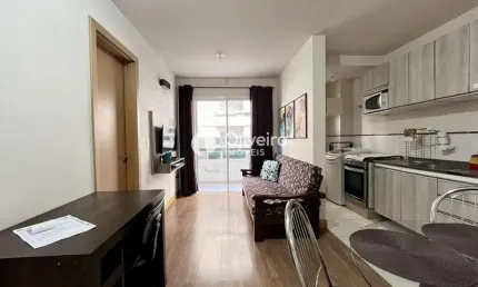 Apartamento central com 1 dormitório e garagem 100% mobiliado!