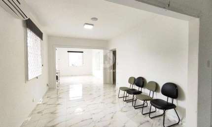 Sobrado com 3 dormitórios à venda, 235 m² por R$ 1.350.000 - Ponta da Praia - Santos/SP