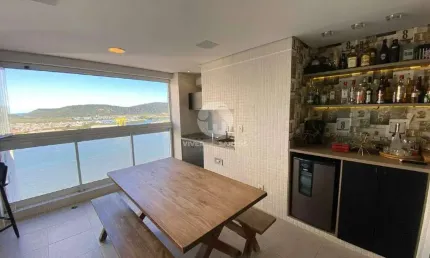 Apartamento a venda na ponta da praia com vista mar, 03 suítes e lazer completo
