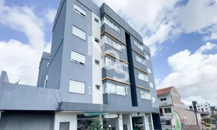 Apartamento à venda com terraço e dois dormitórios.
