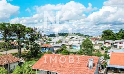 Casa de 03 Dormitórios no Bairro Aparecida em Flores da Cunha