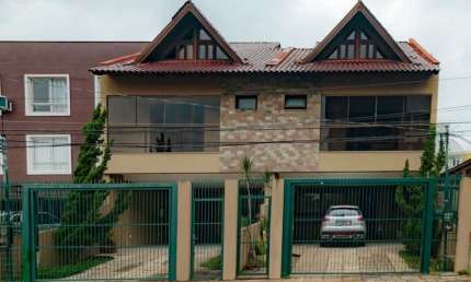 Casa com 3 quartos à venda na Rua Dom Jaime de Barros Câmara, 705, Sarandi, Porto Alegre