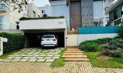 CASA EM CONDOMÍNIO 4 DORMITÓRIOS (300m²), 4 SUÍTES, MOBILIADA, VARANDA, 4 VAGAS. NO CONDOMÍNIO BURLE MARX