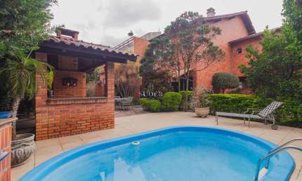 Casa com 5 quartos à venda na Rua São Manoel, 257, Rio Branco, Porto Alegre por R$ 2.350.000
