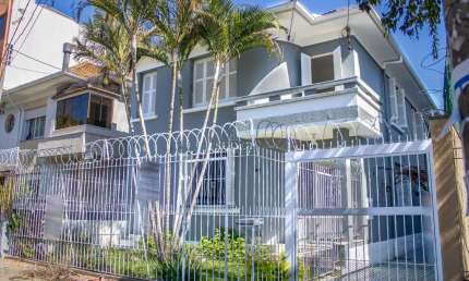 Casa com 5 quartos à venda na Rua João Guimarães, 978, Santa Cecília, Porto Alegre por R$ 1.780.000