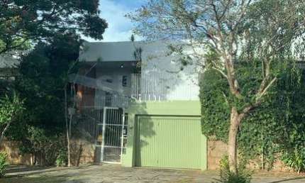 Casa com 4 quartos à venda na Ruperti, 50, Chácara das Pedras, Porto Alegre por R$ 2.300.000