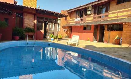 Casa com 4 quartos à venda na Rua Professor Fernando Carneiro, 287, Três Figueiras, Porto Alegre por R$ 2.650.000
