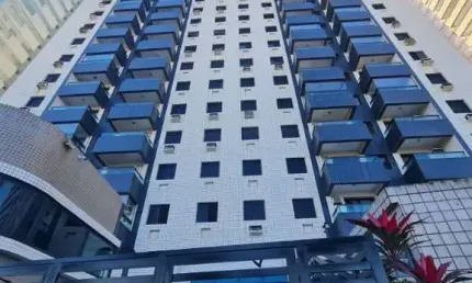 Imperdível apartamento em prédio frente ao mar em praia grande com 2 dormitórios, 1 suíte, 1 sala, 1 banheiro, 1 vaga, 76m².