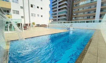 Apartamento à venda na Guilhermina, Praia Grande-SP: 2 quartos, 1 suíte, 2 salas, 2 banheiros, 1 vaga de garagem, 79m² de área. Venha conferir!