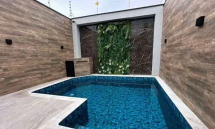 Imperdível casa à venda em Praia Grande-SP, bairro Maracanã: 2 dormitórios, 1 suíte, 2 salas, 3 banheiros, 3 vagas, 110m².