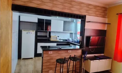Apartamento para venda ou locação em Praia Grande-SP, no bairro Caiçara: 1 quarto, 1 sala, 1 vaga de garagem, 52m².