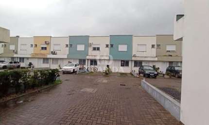 Casa em condomínio fechado com 2 quartos à venda na Avenida Juca Batista, 9742, Belém Novo, Porto Alegre por R$ 185.000