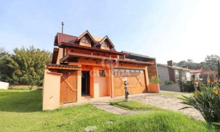 Casa em condomínio fechado com 3 quartos à venda na Avenida Juca Batista, 8000, Belém Novo, Porto Alegre por R$ 1.385.000