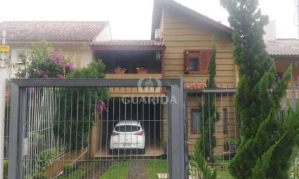 Casa com 4 quartos à venda na Rua Professor Antônio José Remião, 300, Espírito Santo, Porto Alegre por R$ 820.000