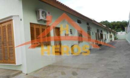 Casa em condomínio fechado com 2 quartos à venda na Rua Padre João Batista Reus, 2443, Camaquã, Porto Alegre por R$ 249.000