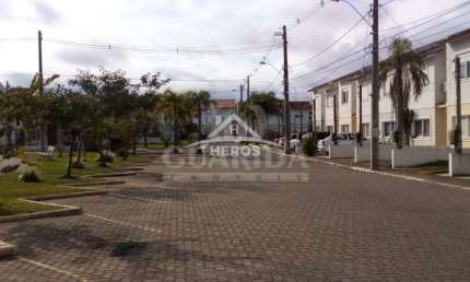 Casa em condomínio fechado com 3 quartos à venda na Avenida Edgar Pires de Castro, 2520, Hípica, Porto Alegre por R$ 382.000