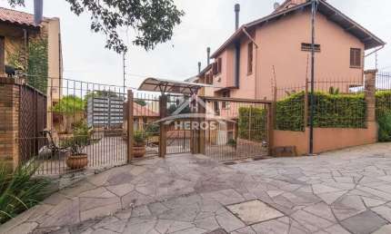 Casa em condomínio fechado com 3 quartos à venda na Rua Giorgio Negroni, 801, Espírito Santo, Porto Alegre por R$ 425.000