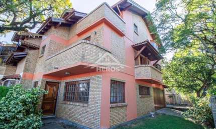Casa em condomínio fechado com 4 quartos à venda na Avenida Guaíba, 10710, Ipanema, Porto Alegre por R$ 1.040.000
