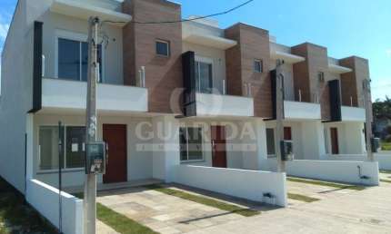 Casa em condomínio fechado com 3 quartos à venda na Rua Francisco Mattos Terres, 565, Aberta dos Morros, Porto Alegre por R$ 470.000