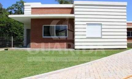 Casa em condomínio fechado com 3 quartos à venda na Rua Canísio Binsfeld, 226, Hípica, Porto Alegre por R$ 645.000