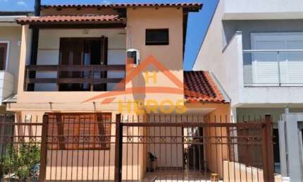 Casa em condomínio fechado com 3 quartos à venda na Rua Pau Brasil, 34, Hípica, Porto Alegre por R$ 550.000