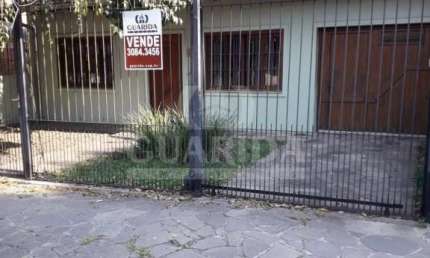 Casa com 3 quartos à venda na Rua Victor Issler, 83, Espírito Santo, Porto Alegre por R$ 664.000