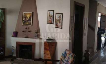 Casa com 3 quartos à venda na Rua Isidoro Bettio, 103, Hípica, Porto Alegre por R$ 500.000