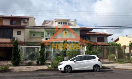 Casa com 3 quartos à venda na Rua Claudio da Silva Pinto, 92, Espírito Santo, Porto Alegre por R$ 1.186.000