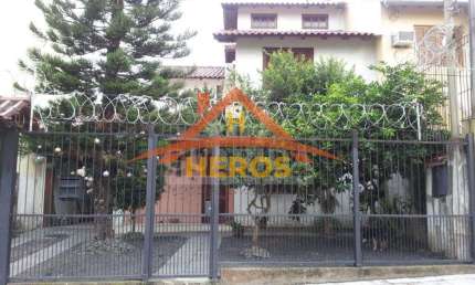 Casa com 3 quartos à venda na Rua Jerolomo Minuzo, 296, Vila Nova, Porto Alegre por R$ 500.000