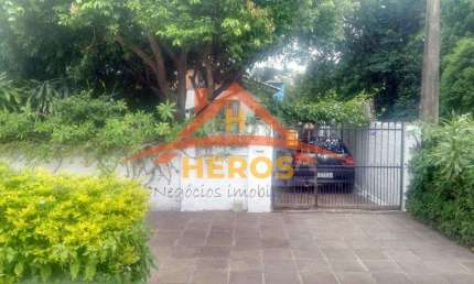 Casa com 5 quartos à venda na Avenida Quaraí, 327, Nonoai, Porto Alegre por R$ 450.000