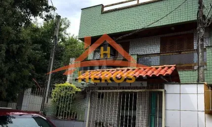 Casa com 3 quartos à venda na Rua Liberal, 1025, Tristeza, Porto Alegre por R$ 600.000