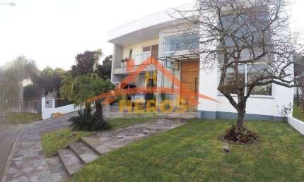 Casa em condomínio fechado com 3 quartos à venda na Rua Francisco Solano Borges, 200, Aberta dos Morros, Porto Alegre por R$ 1.500.000