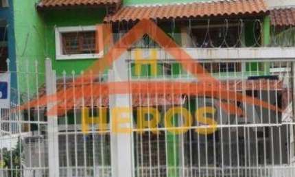 Casa em condomínio fechado com 3 quartos à venda na Rua dos Caiaguais, 258, Espírito Santo, Porto Alegre por R$ 500.000