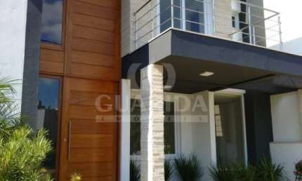 Casa em condomínio fechado com 3 quartos à venda na Rua Carlos Maximiliano Fayet, 300, Hípica, Porto Alegre por R$ 742.000