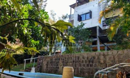 Casa com 5 quartos à venda na Avenida Vicente Monteggia, 2231, Cavalhada, Porto Alegre por R$ 899.000